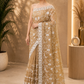Elegant beige-gold embroidered saree