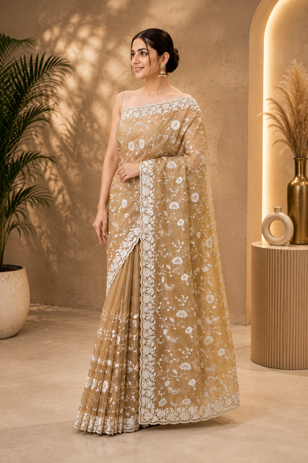 Elegant beige-gold embroidered saree