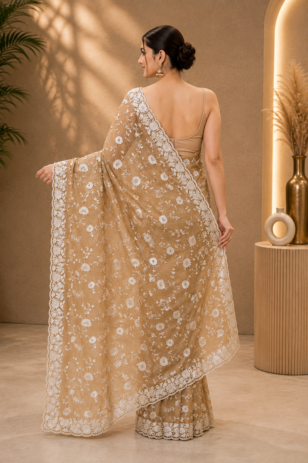 Elegant beige-gold embroidered saree