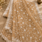 Elegant beige-gold embroidered saree