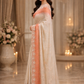 Beautifully crafted ivory and peach designer saree